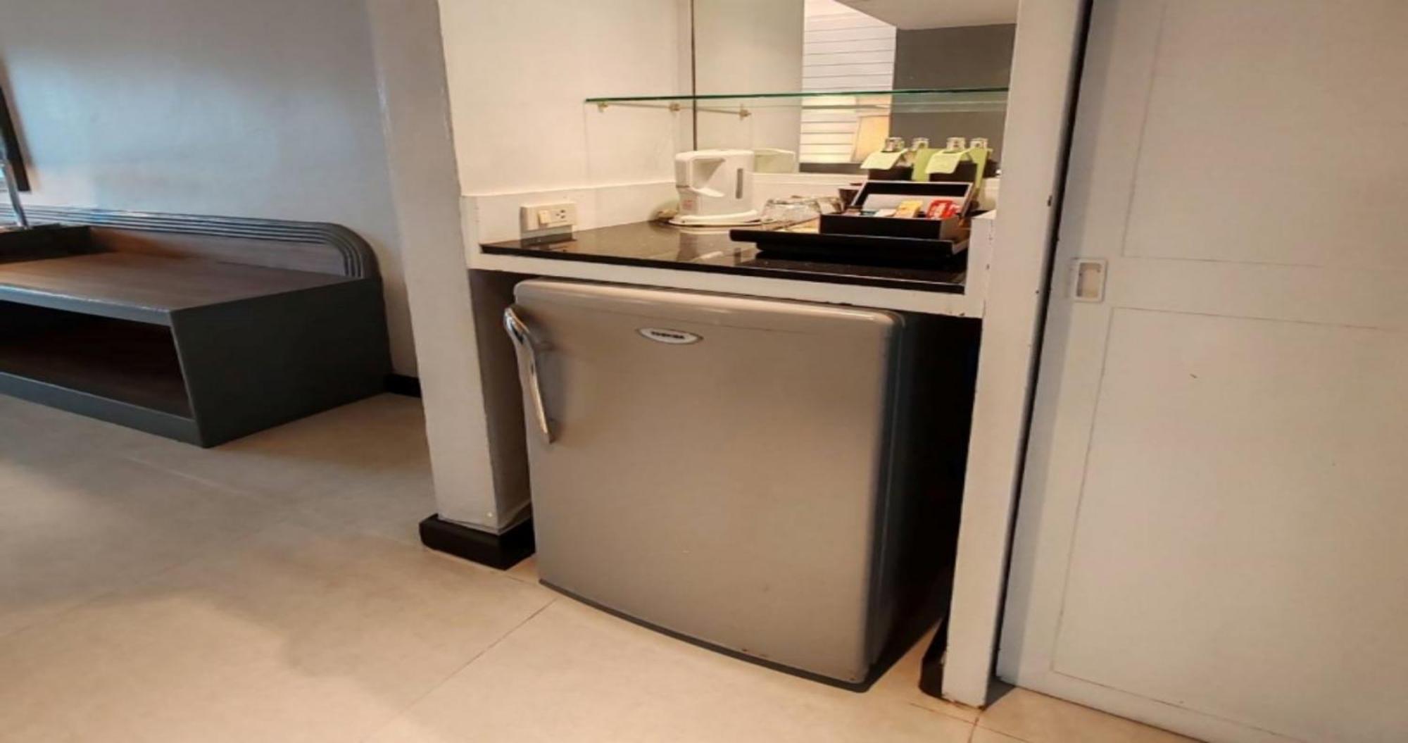 Siam Bayshore Resort Pattaya Exterior photo A small refrigerator in a hotel room